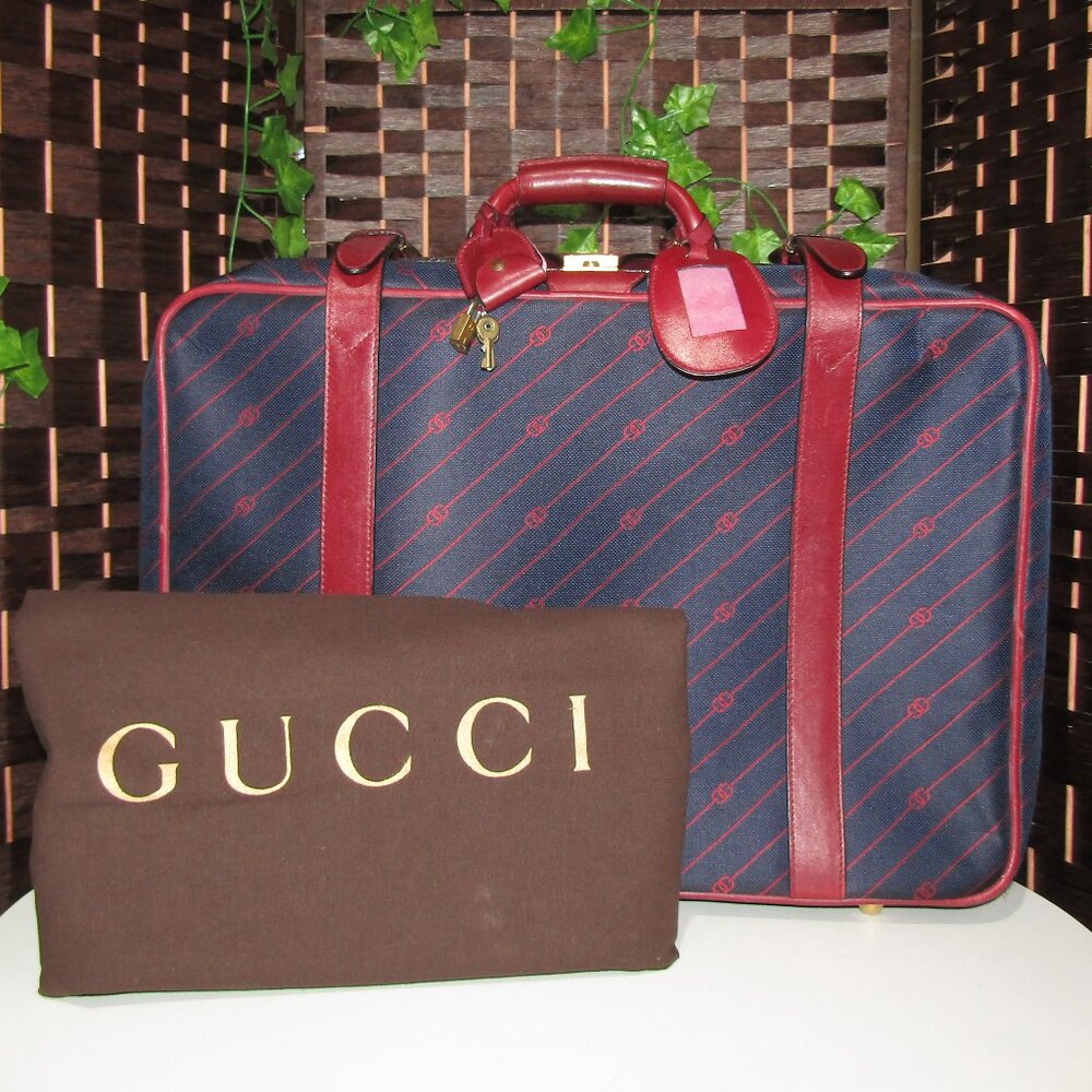 $3 START AUTH $3000 AUTH GUCCI RED & BLUE CANVAS AN LEATHER SUITCASE